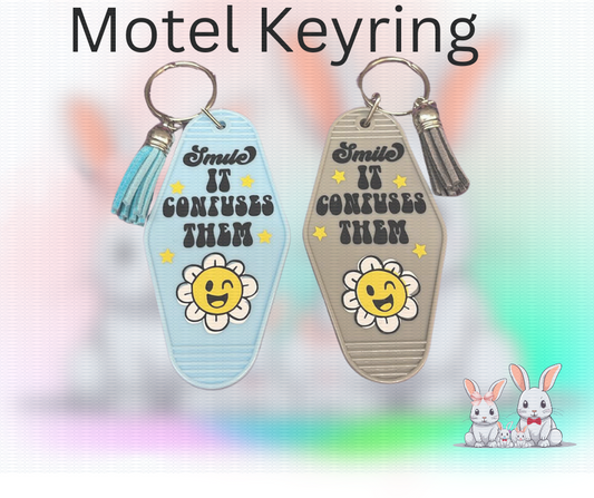 smile it confuses them motel style keyring