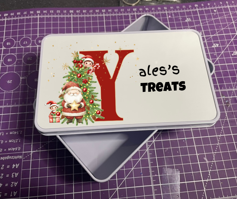 Santa and his little elf personalised tin